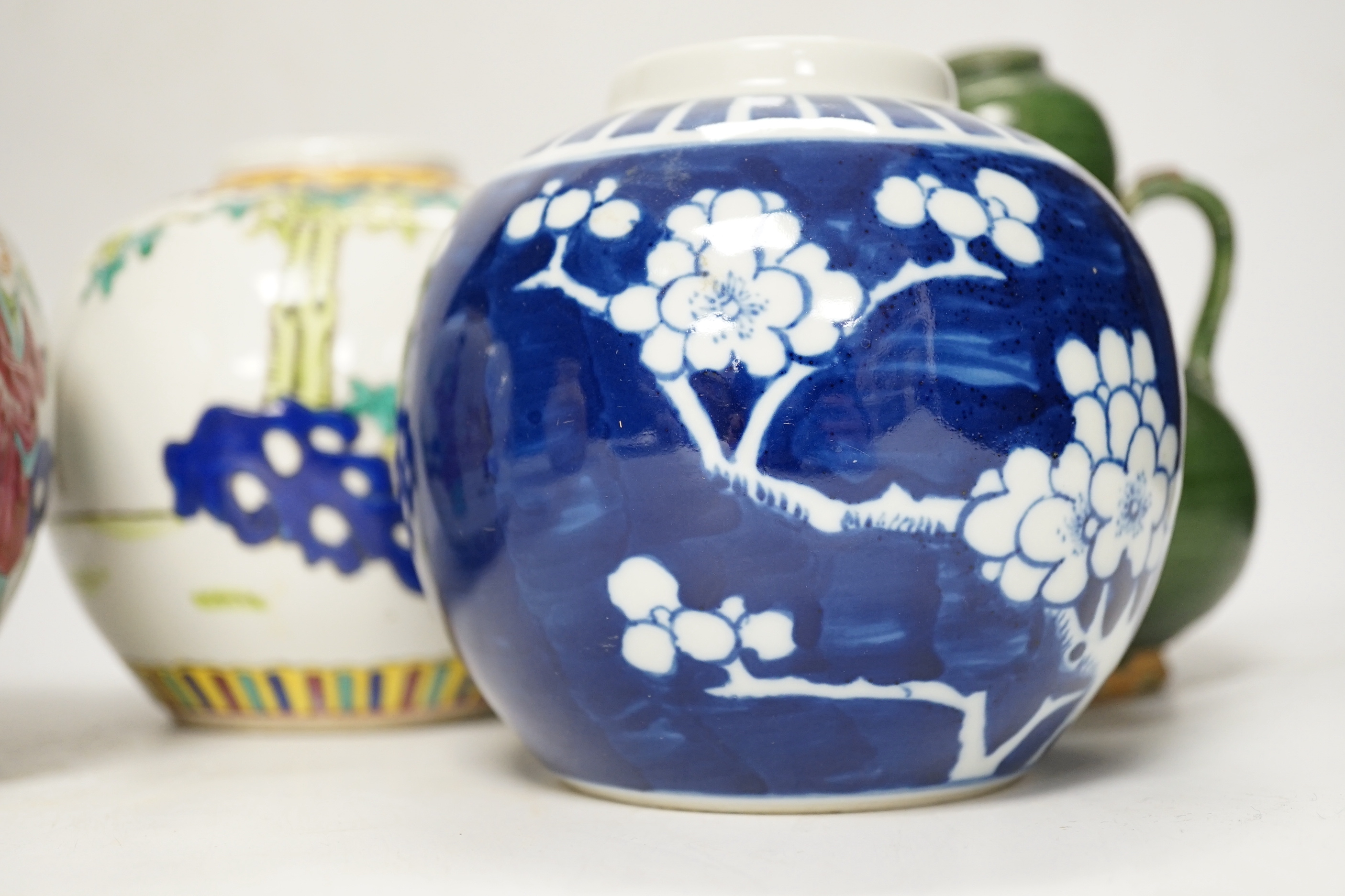 A Chinese blue and white ginger jar, a green two-handled double gourd vase, a pair of vases, and another, tallest 15cm